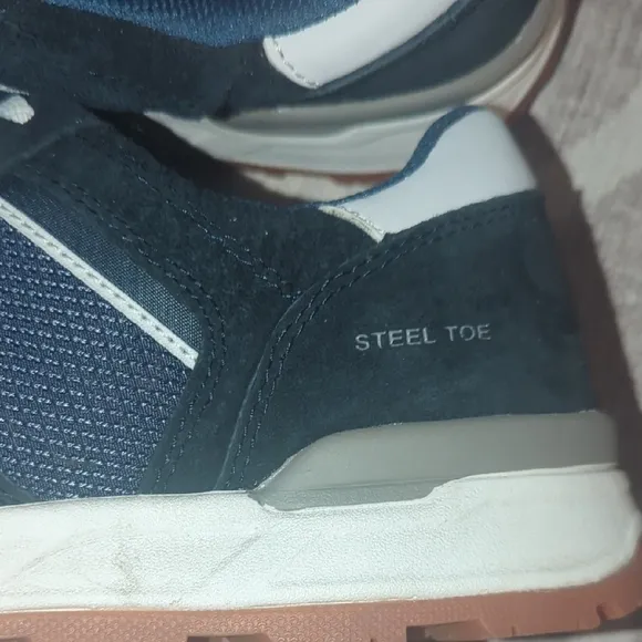 Caterpillar Dark Blue Sneakers with Low-Top Design and Textured Fabric