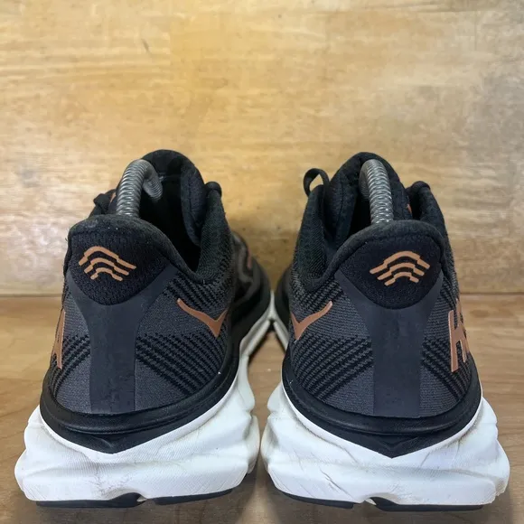 Hoka One One Clifton 9 Womens Size 9 (B) Running Shoes Sneakers Black Gold