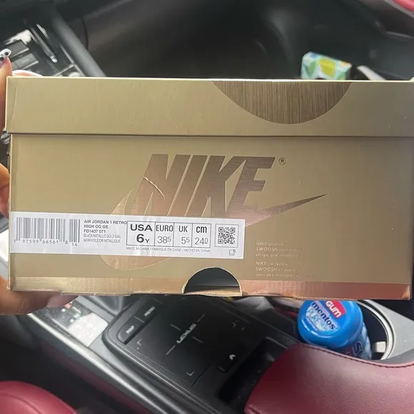 Nike Air Jordan 1’s Boys Black and Gold Sneakers