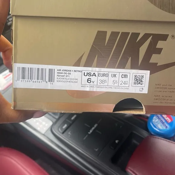 Nike Air Jordan 1’s Boys Black and Gold Sneakers