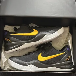 Nike Black and Gold Athletic Shoes