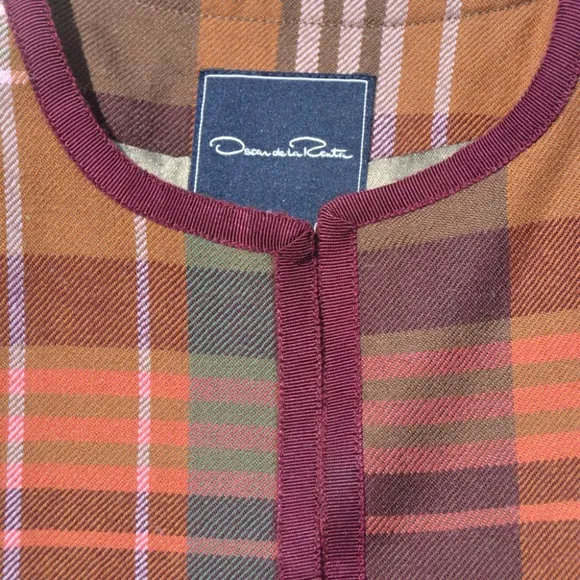 Oscar de la Renta jacket of 100% Wool, plaid pattern with claret grosgrain ribbo